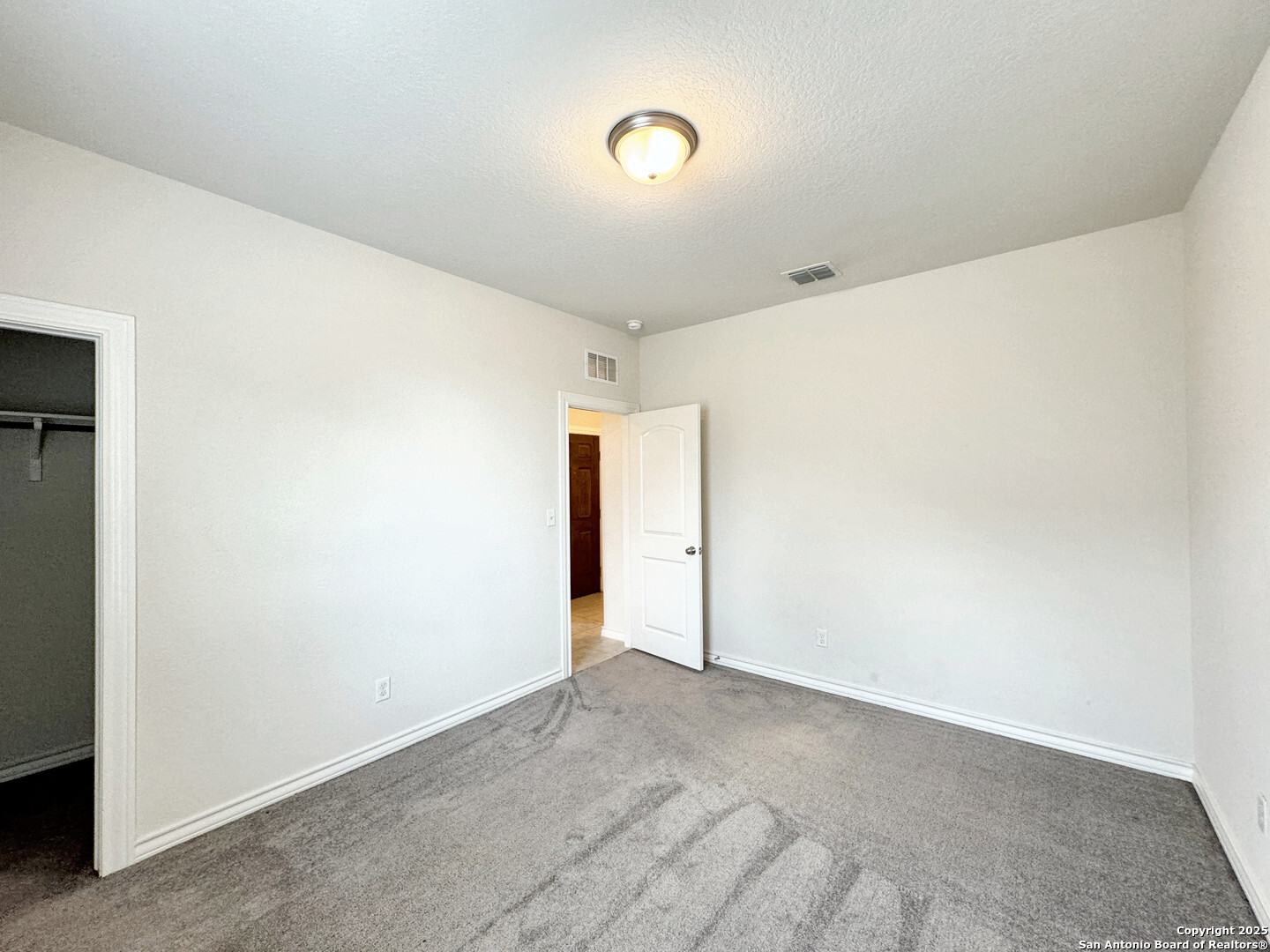 2858 Ridge Berry Road New Braunfels, TX 78130 - Photo 6 of 19 a view of an empty room