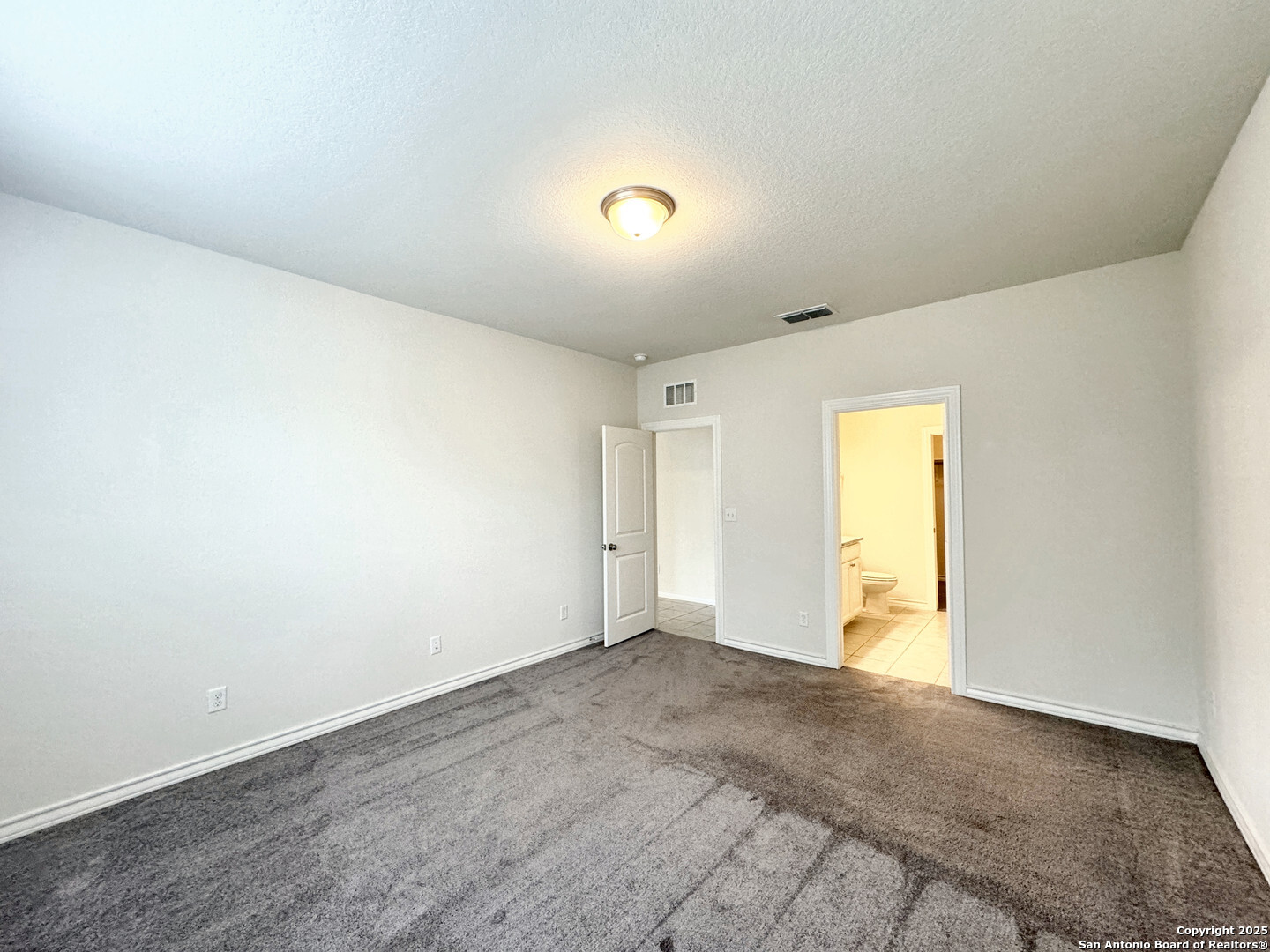 2858 Ridge Berry Road New Braunfels, TX 78130 - Photo 9 of 19 an empty room with a empty space and windows