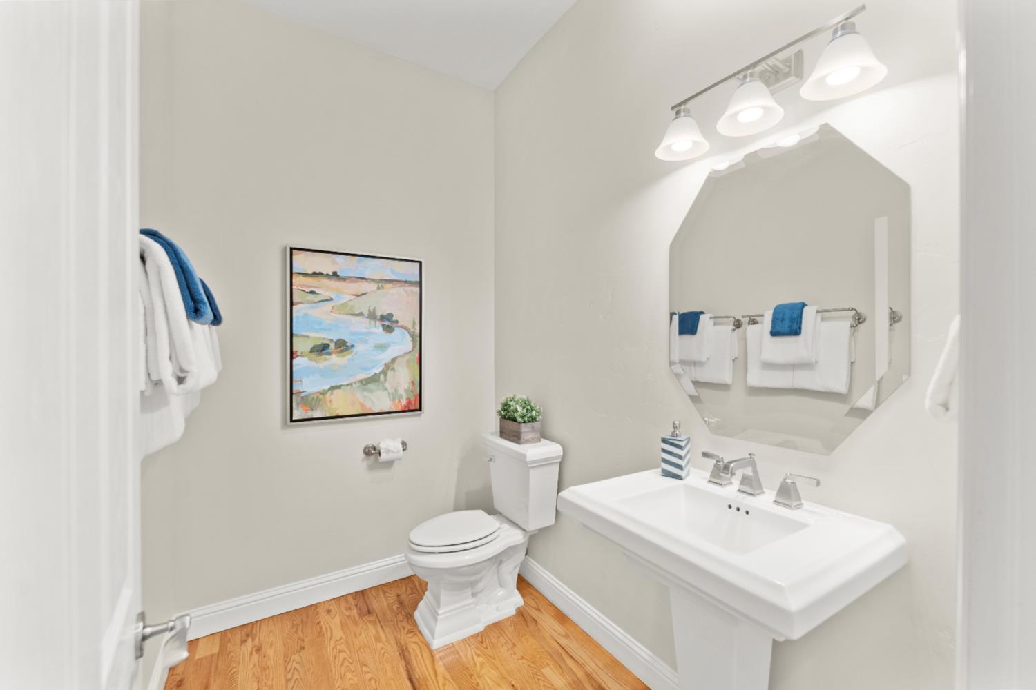 943 Eden Valley Road Colfax, CA 95713 - Photo 31 of 82 a bathroom with a sink mirror and toilet