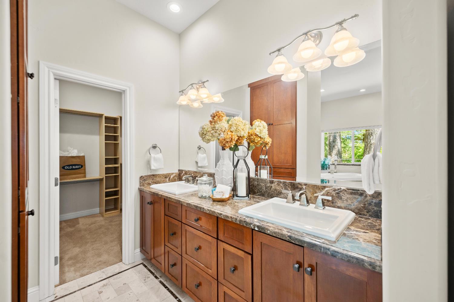 943 Eden Valley Road Colfax, CA 95713 - Photo 37 of 82 a bathroom with a sink double vanity and a mirror