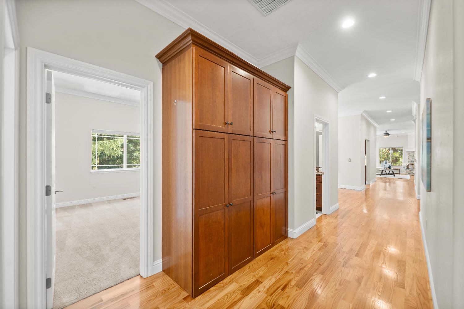 943 Eden Valley Road Colfax, CA 95713 - Photo 45 of 82 a view of a hallway with wooden floor and windows