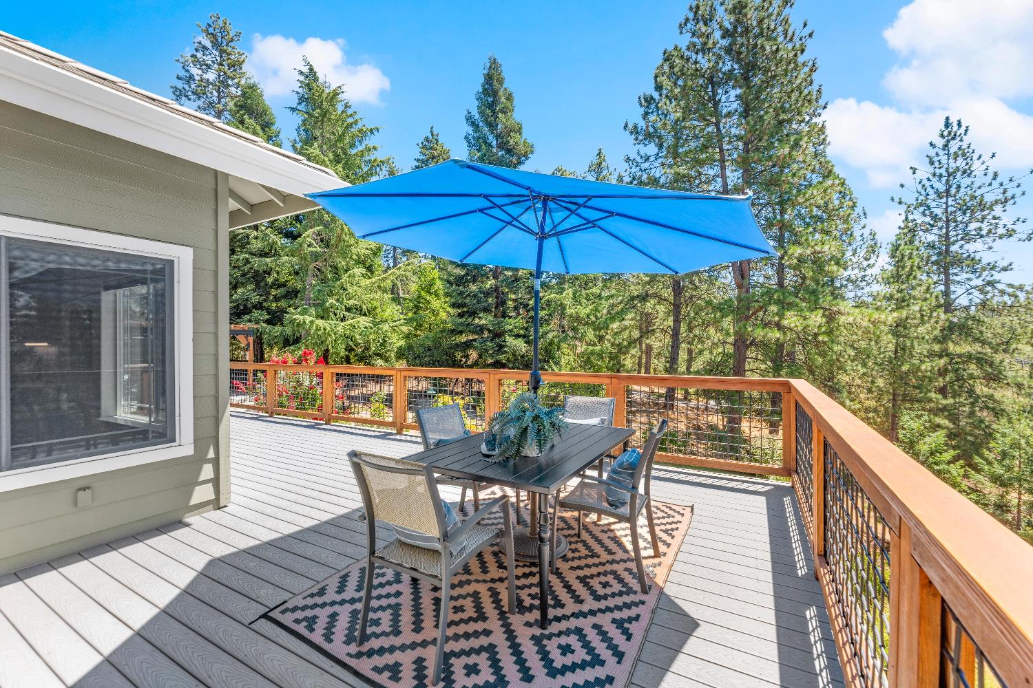 943 Eden Valley Road Colfax, CA 95713 - Photo 57 of 82 a view of balcony with outdoor seating and wooden floor