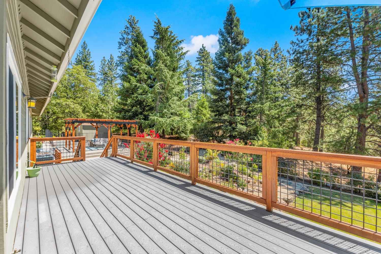 943 Eden Valley Road Colfax, CA 95713 - Photo 59 of 82 a view of balcony with wooden floor and fence