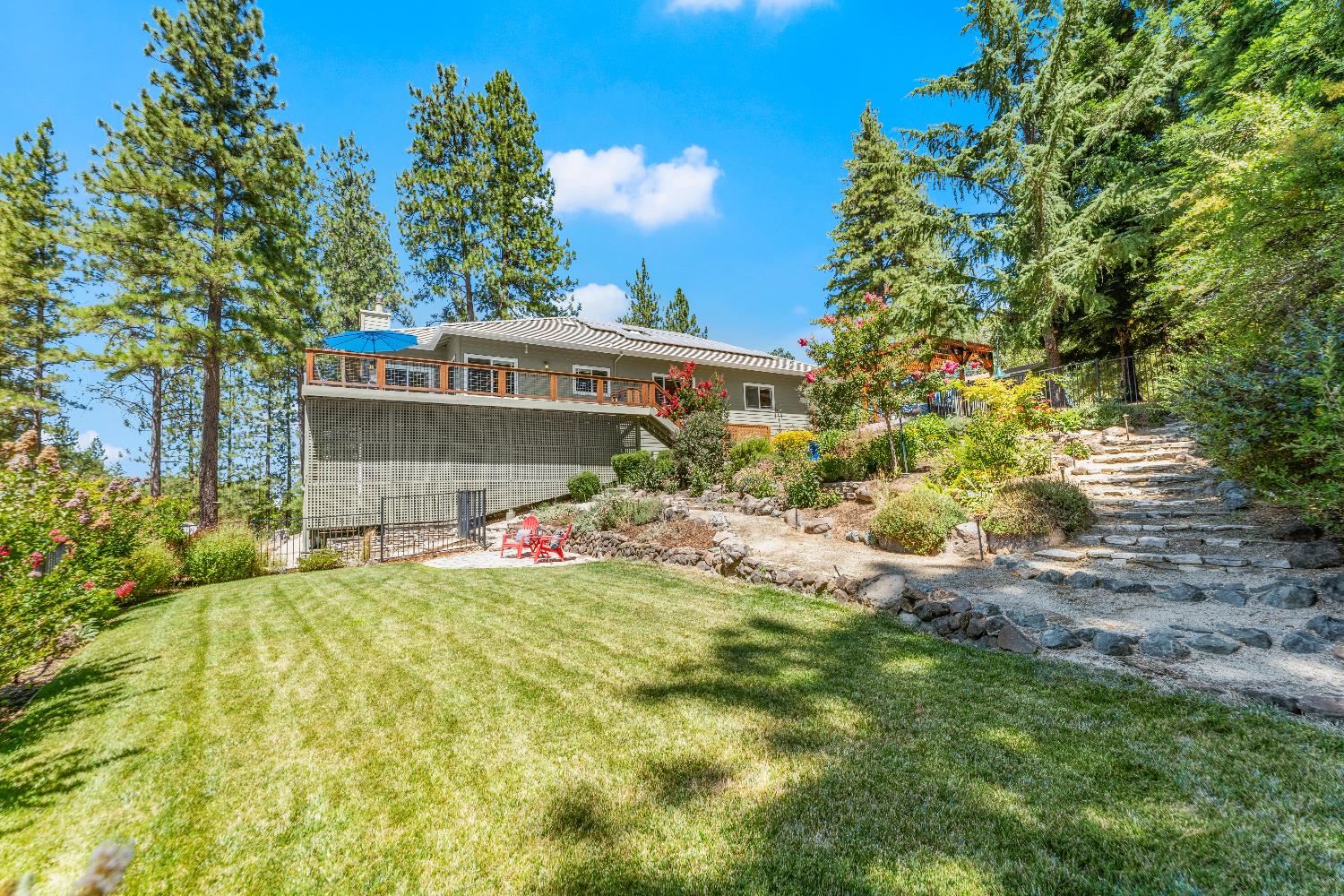 943 Eden Valley Road Colfax, CA 95713 - Photo 65 of 82 a view of a house with a yard and potted plants