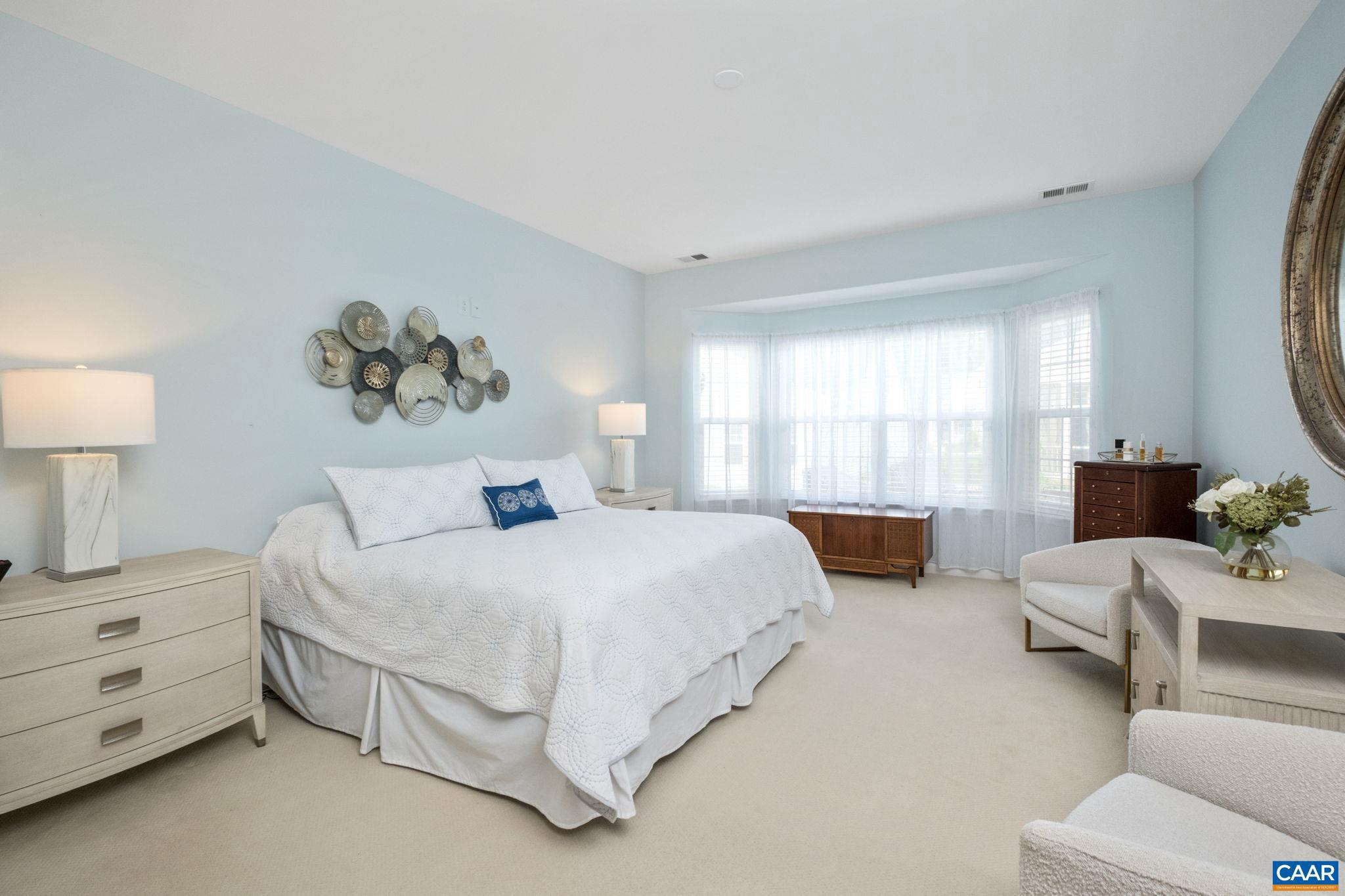 56 John Rucker Drive Ruckersville, VA 22968 - Photo 17 of 38 a bedroom with bed and window