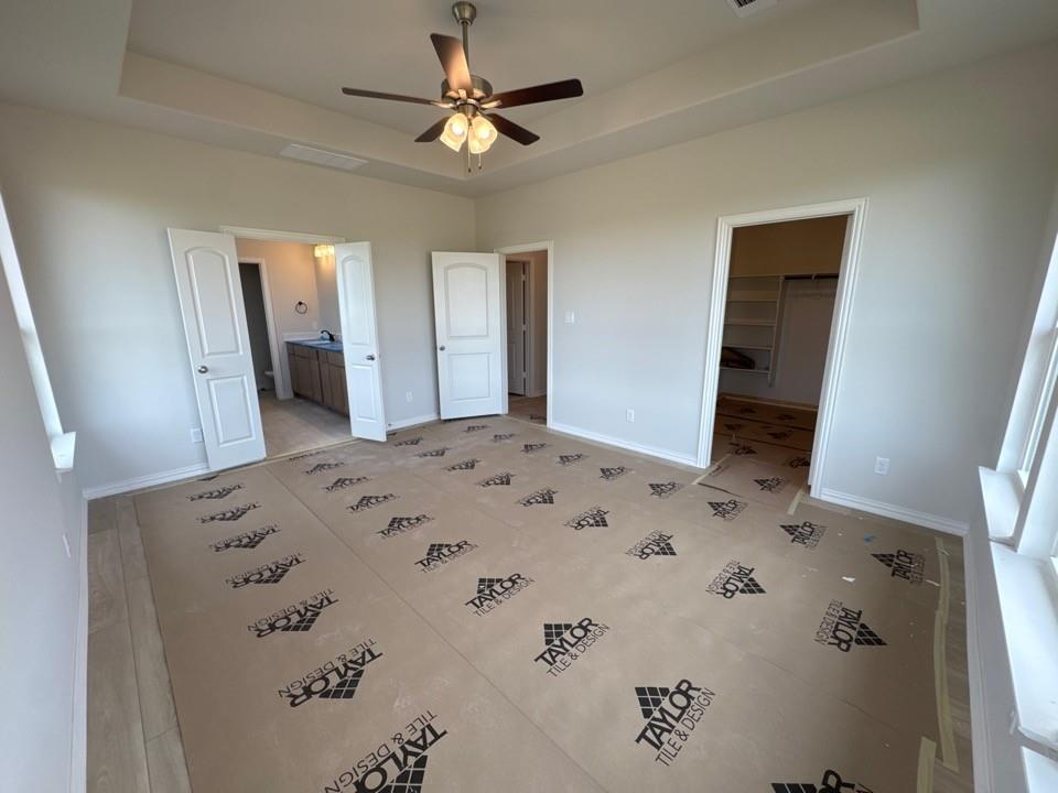 267 Mdw Vista Drive Rhome, TX 76078 - Photo 12 of 13 a large bathroom with a large mirror a sink and a mirror