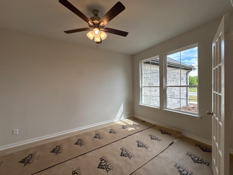 267 Mdw Vista Drive Rhome, TX 76078 - Photo 4 of 13 a view of an empty room with a window