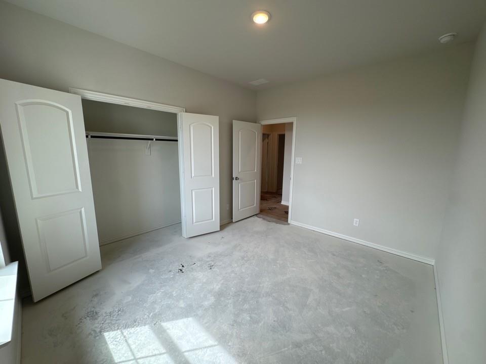 267 Mdw Vista Drive Rhome, TX 76078 - Photo 5 of 13 an empty room with closet area