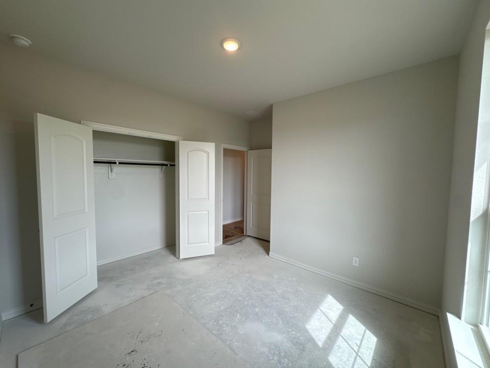 267 Mdw Vista Drive Rhome, TX 76078 - Photo 6 of 13 an empty room with windows