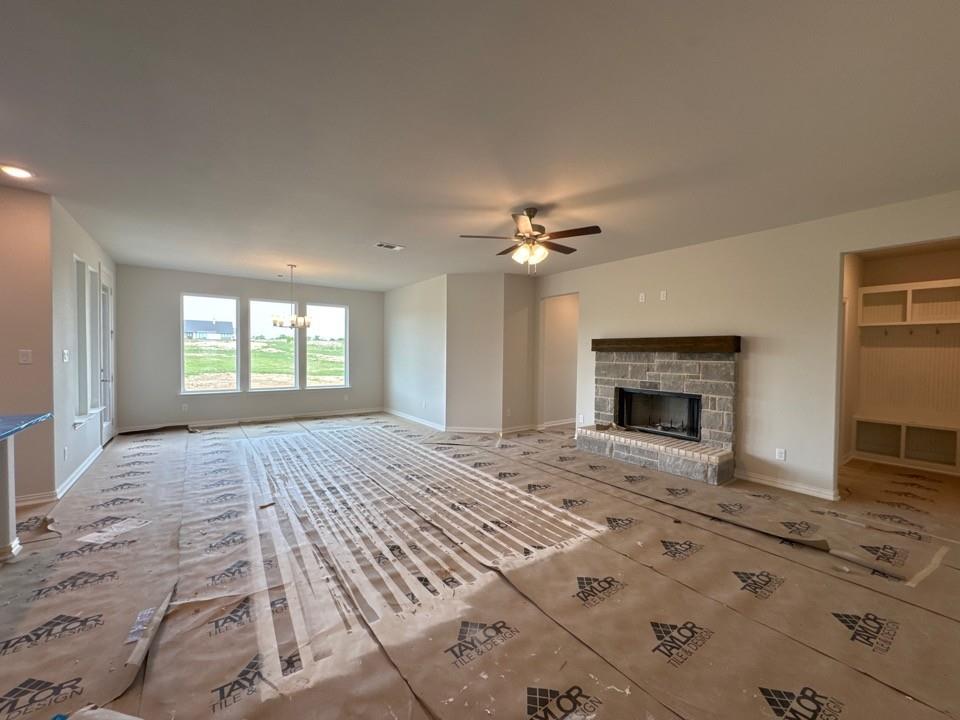 267 Mdw Vista Drive Rhome, TX 76078 - Photo 10 of 13 a view of an empty room with window and fire place