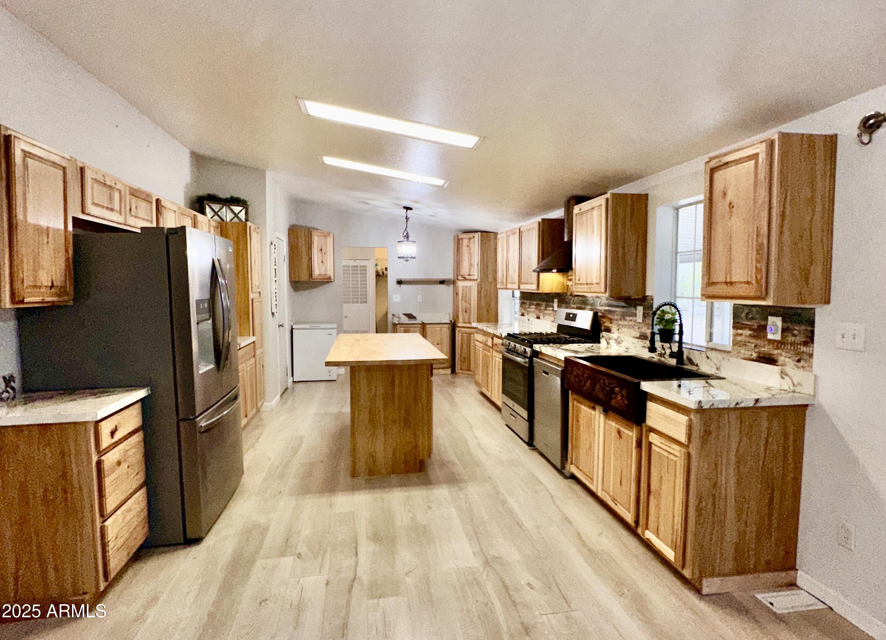 80 Acr 8050 Road Concho, AZ 85924 - Photo 12 of 30 a large kitchen with stainless steel appliances