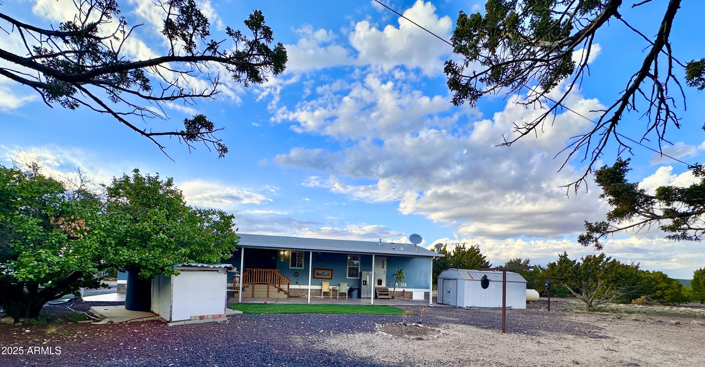 80 Acr 8050 Road Concho, AZ 85924 - Photo 27 of 30 a front view of a house with garden