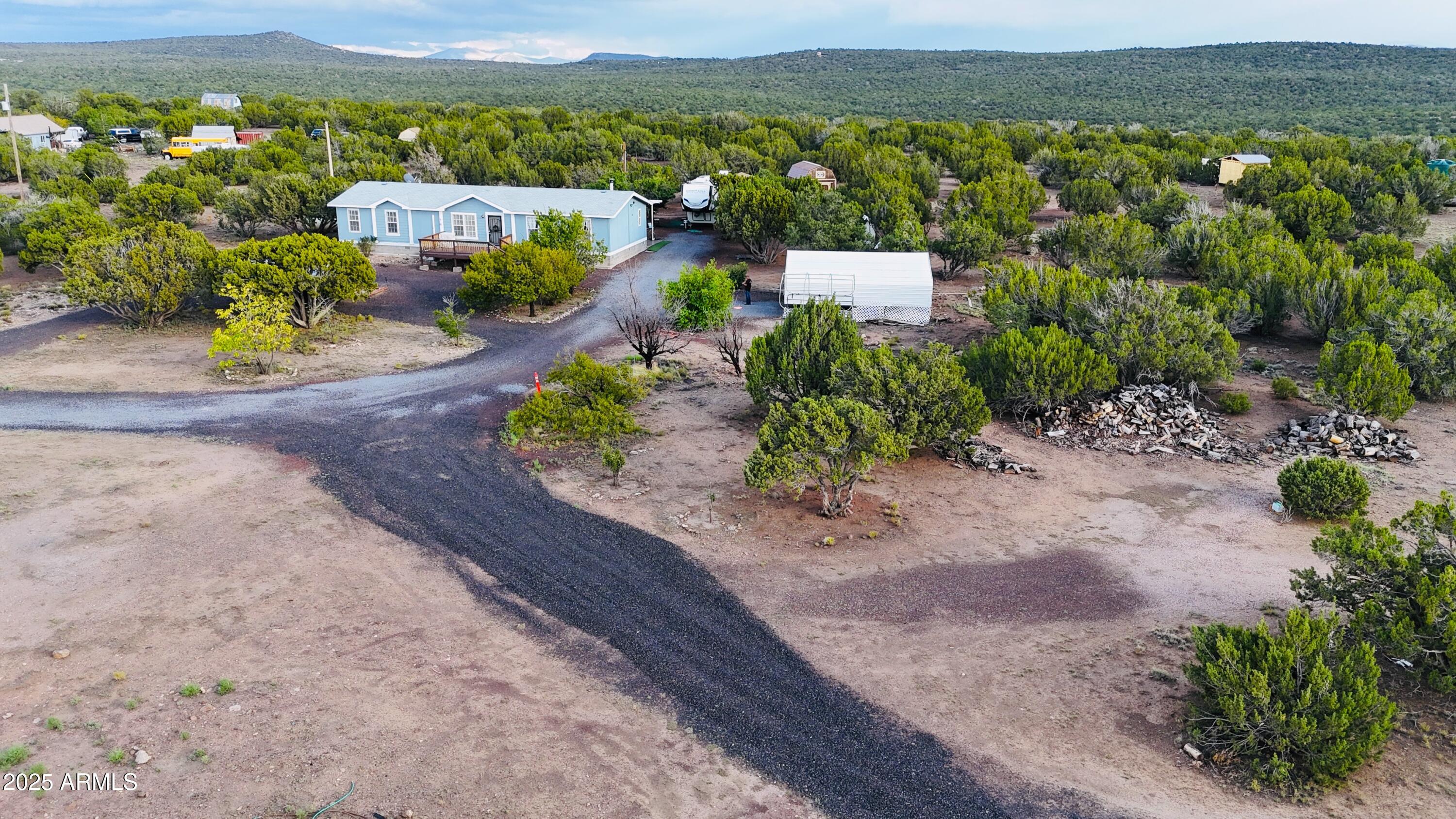 80 Acr 8050 Road Concho, AZ 85924 - Photo 5 of 30 an aerial view of a house with a garden