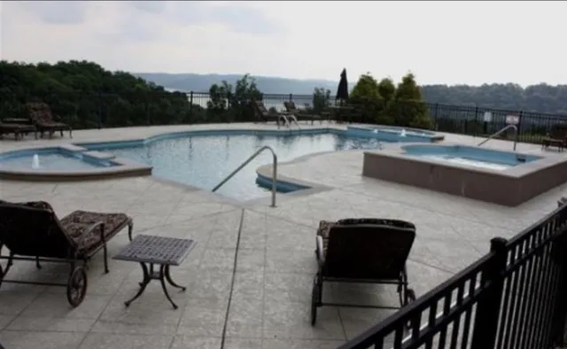 a terrace of a house with outdoor seating