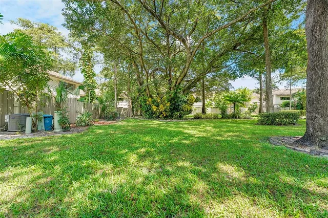 a kitchen with a refrigerator stove and sink
