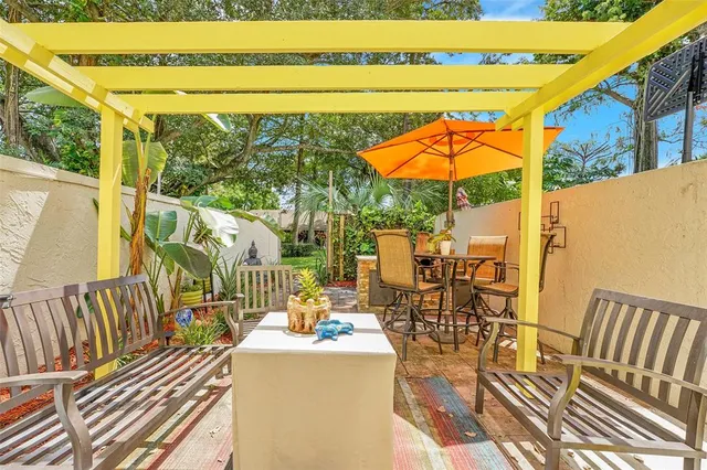 a view of balcony with furniture