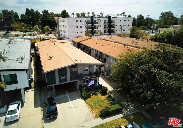 a view of roof deck with patio