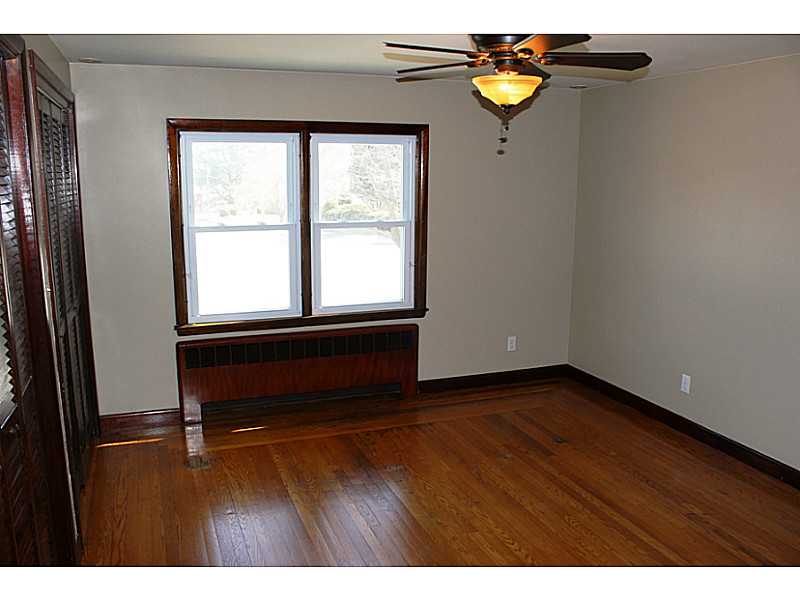 435 Budlong Road Cranston, RI 02920 - Photo 13 of 21 Bedroom. Bedroom 1 with 2 double door wood closets.