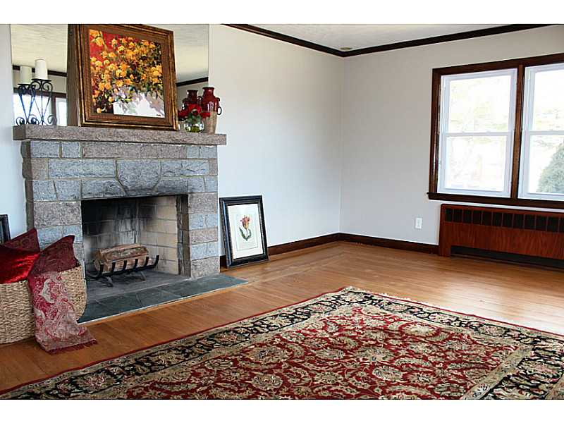 435 Budlong Road Cranston, RI 02920 - Photo 10 of 21 Living Room. Beautiful Blue Stone Fireplace is the focal point of this sun-filled Living Room.
