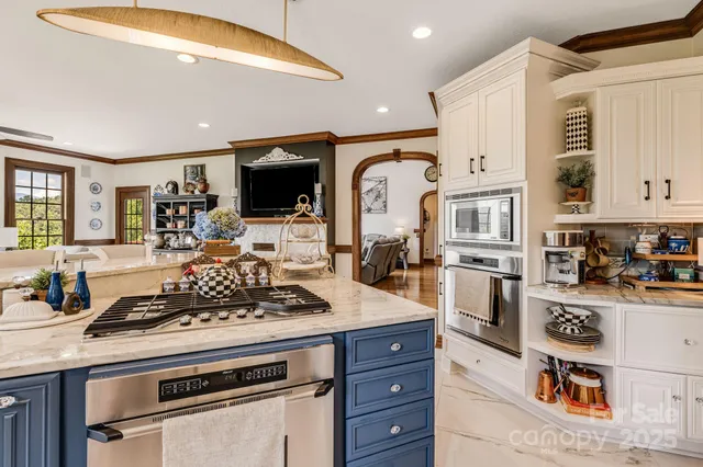 a kitchen with a stove and cabinets