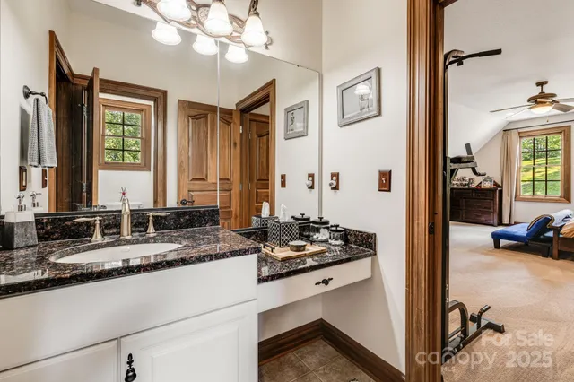 a kitchen with a refrigerator and a sink