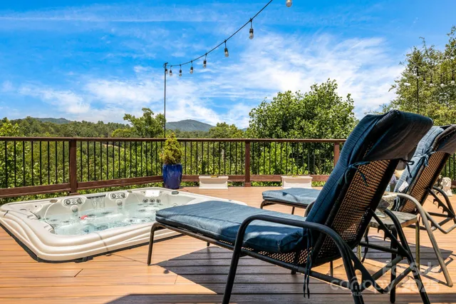 a view of an outside dining space with furniture