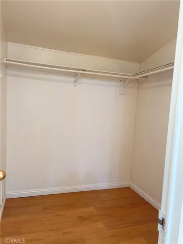 a bathroom with a bathtub and a toilet