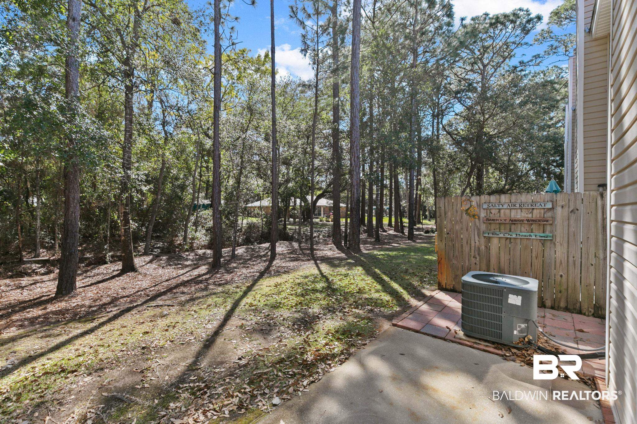 1517 Regency Road, Unit 83 Gulf Shores, AL 36542 - Photo 16 of 24 View of yard with a patio area