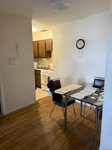 a workspace with furniture and wooden floor
