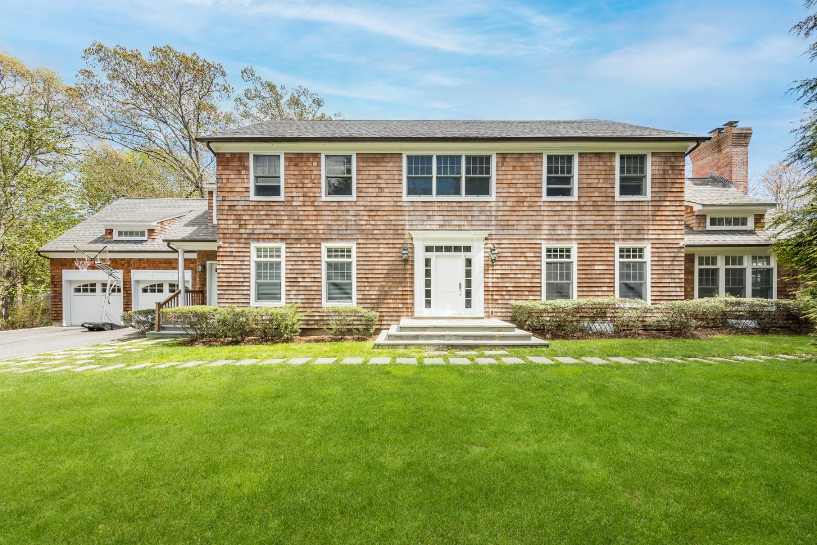 160 Ferry Road Sag Harbor, NY 11963 - Photo 2 of 25 front view of a house with a yard