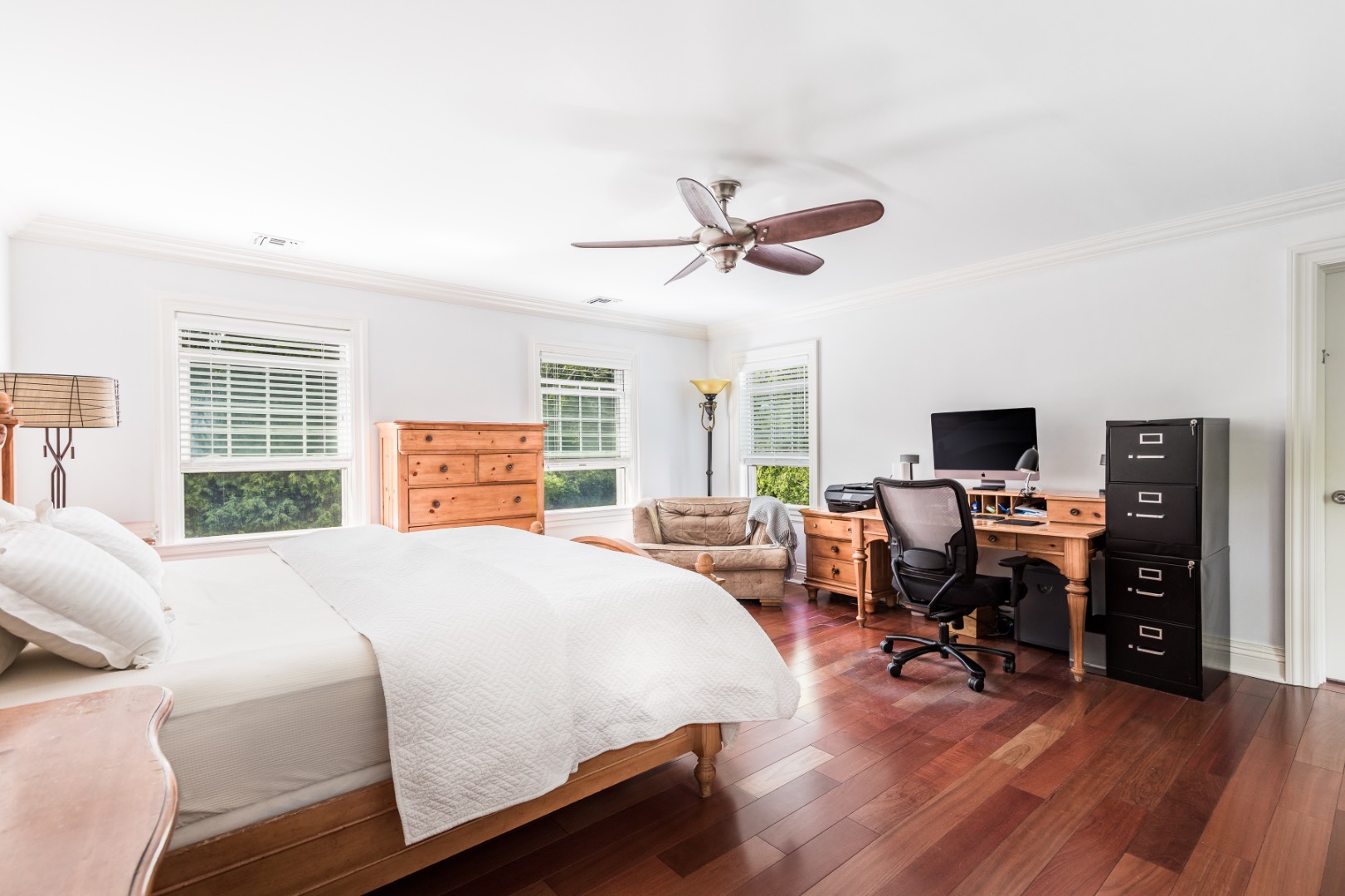 160 Ferry Road Sag Harbor, NY 11963 - Photo 16 of 25 a bedroom with a bed and a flat screen tv