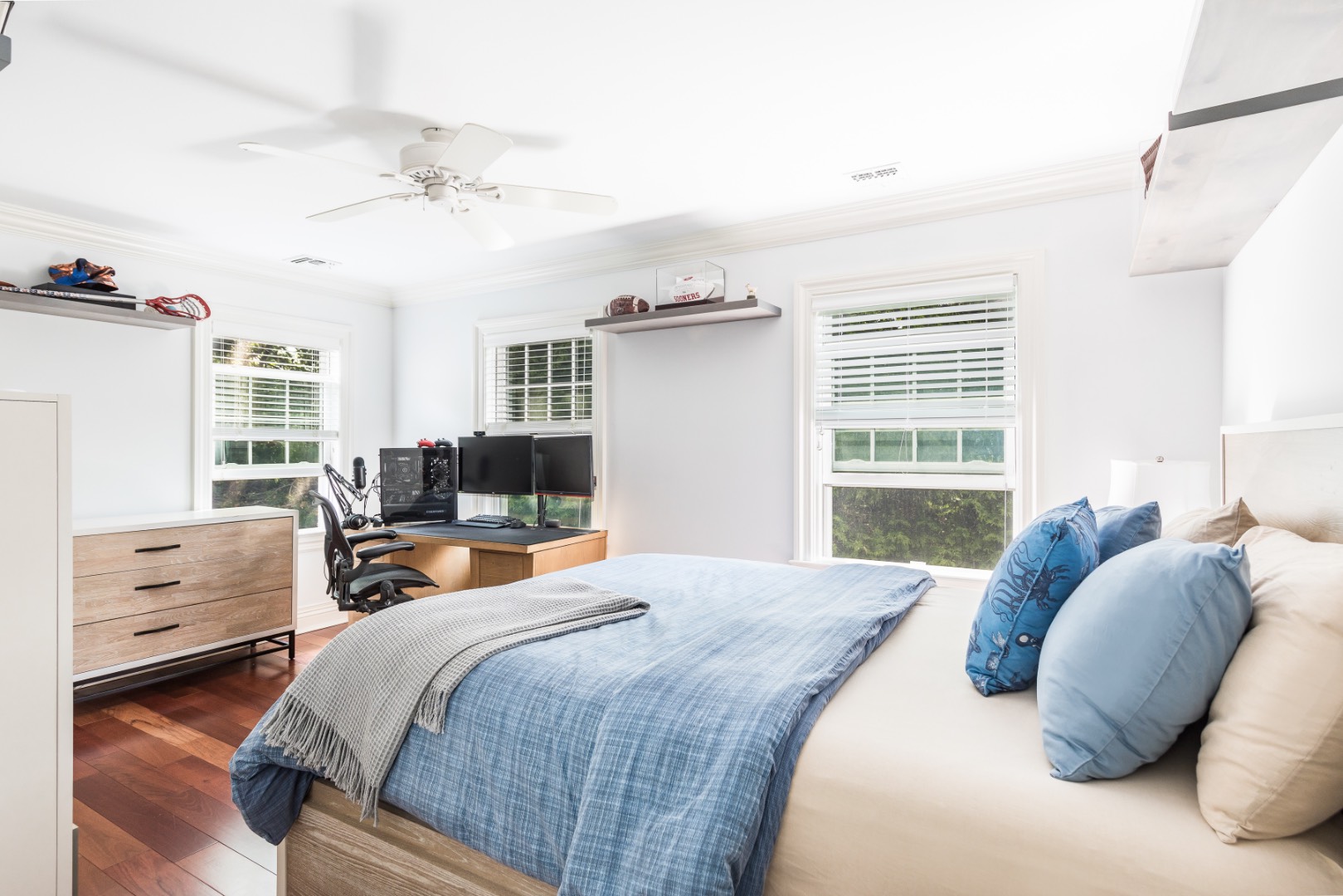 160 Ferry Road Sag Harbor, NY 11963 - Photo 20 of 25 a bedroom with a bed and wooden floor