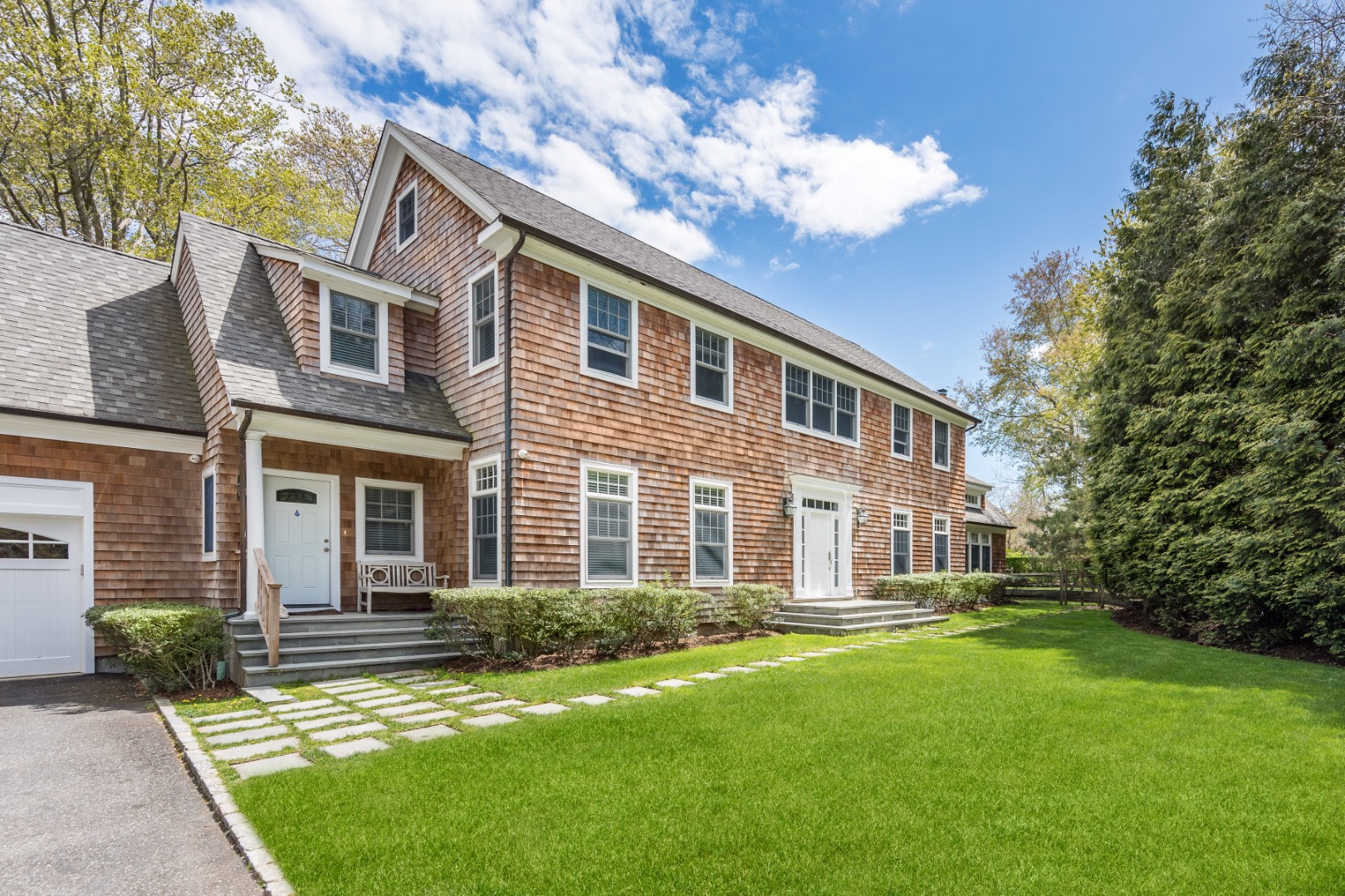 160 Ferry Road Sag Harbor, NY 11963 - Photo 25 of 25 a front view of a house with garden and porch