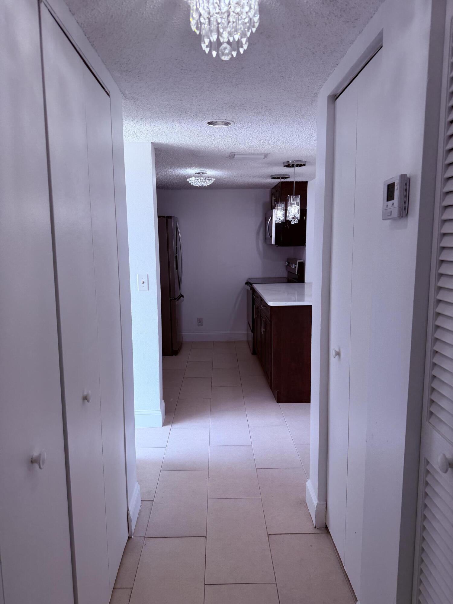 6347 La Costa Drive, Unit B Boca Raton, FL 33433 - Photo 10 of 17 corridor