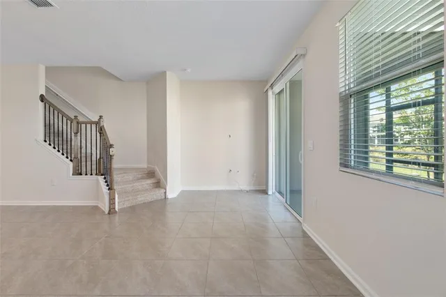 a view of a livingroom with a staircase
