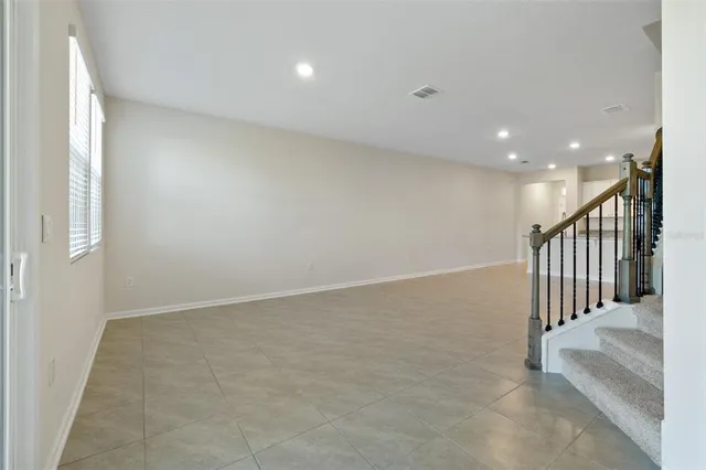 a view of a livingroom with entryway