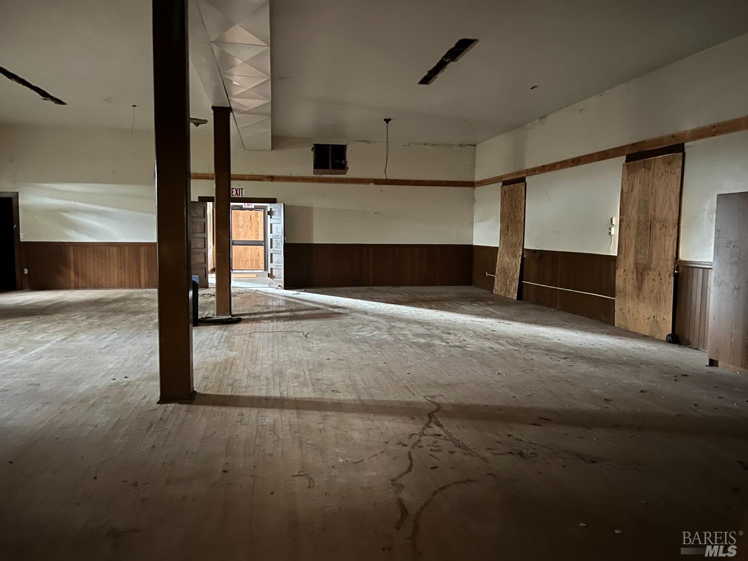 330 South Main Street Willits, CA 95490 - Photo 15 of 16 a view of empty room with a fireplace and fan
