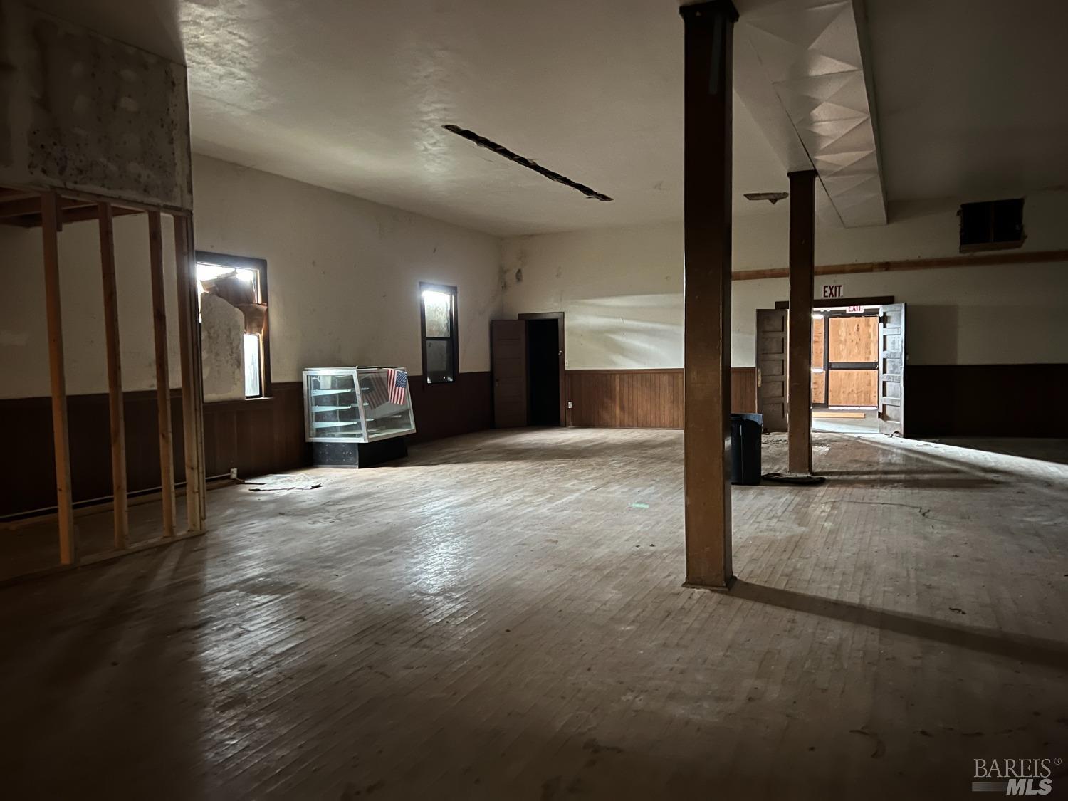330 South Main Street Willits, CA 95490 - Photo 16 of 16 a view of a hall with wooden floor