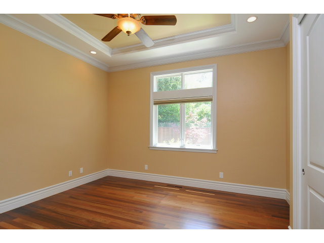 650 Covington Road Los Altos, CA 94024 - Photo 17 of 24 an empty room with wooden floor and windows