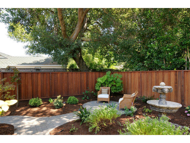 650 Covington Road Los Altos, CA 94024 - Photo 23 of 24 a view of a backyard with plants and a garden