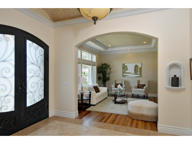 650 Covington Road Los Altos, CA 94024 - Photo 3 of 24 a living room with furniture and a flat screen tv