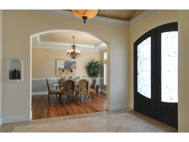 650 Covington Road Los Altos, CA 94024 - Photo 7 of 24 a view of a dining room with furniture and a chandelier