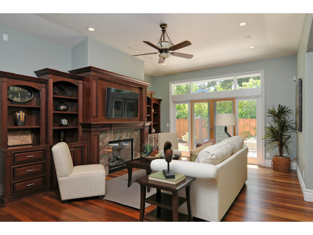 650 Covington Road Los Altos, CA 94024 - Photo 10 of 24 a living room with furniture a flat screen tv and a large window