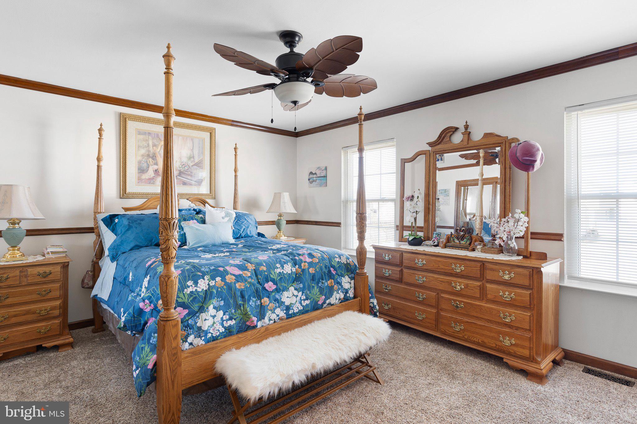 502 Mason Drive New Castle, DE 19720 - Photo 12 of 17 a bed room with a bed window and a dresser