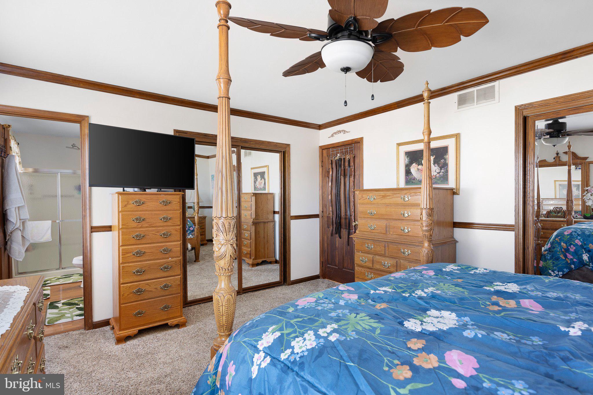 502 Mason Drive New Castle, DE 19720 - Photo 13 of 17 a bedroom with a bed and a flat tv screen