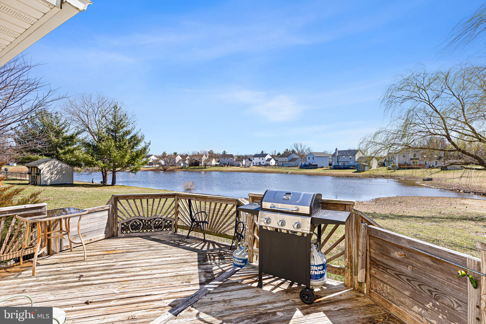 502 Mason Drive New Castle, DE 19720 - Photo 2 of 17 a view of a lake with couches and city view