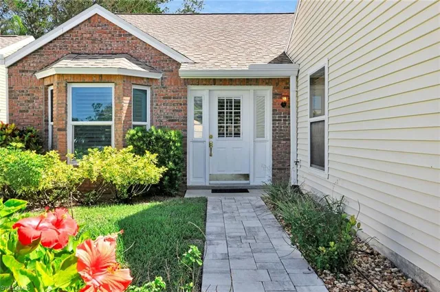 a front view of house with an outdoor space