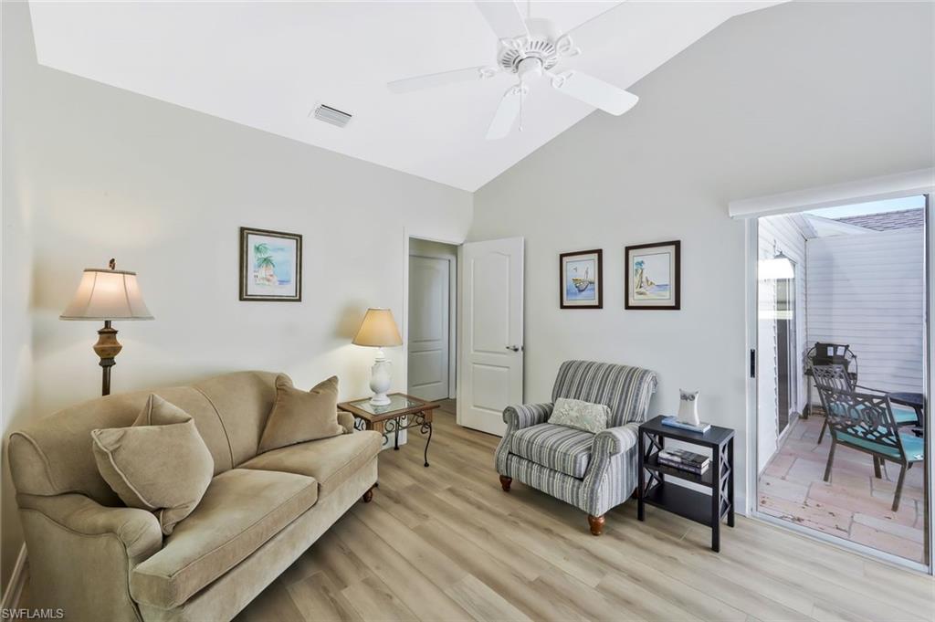 15350 Wimborne Lane, Unit 2 Naples, FL 34110 - Photo 17 of 42 a living room with furniture