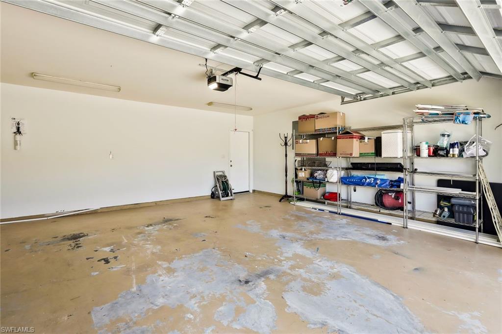 15350 Wimborne Lane, Unit 2 Naples, FL 34110 - Photo 27 of 42 a view of a storage & utility room