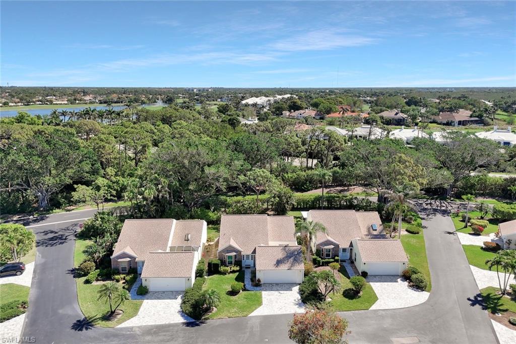 15350 Wimborne Lane, Unit 2 Naples, FL 34110 - Photo 36 of 42 an aerial view of a house with a yard